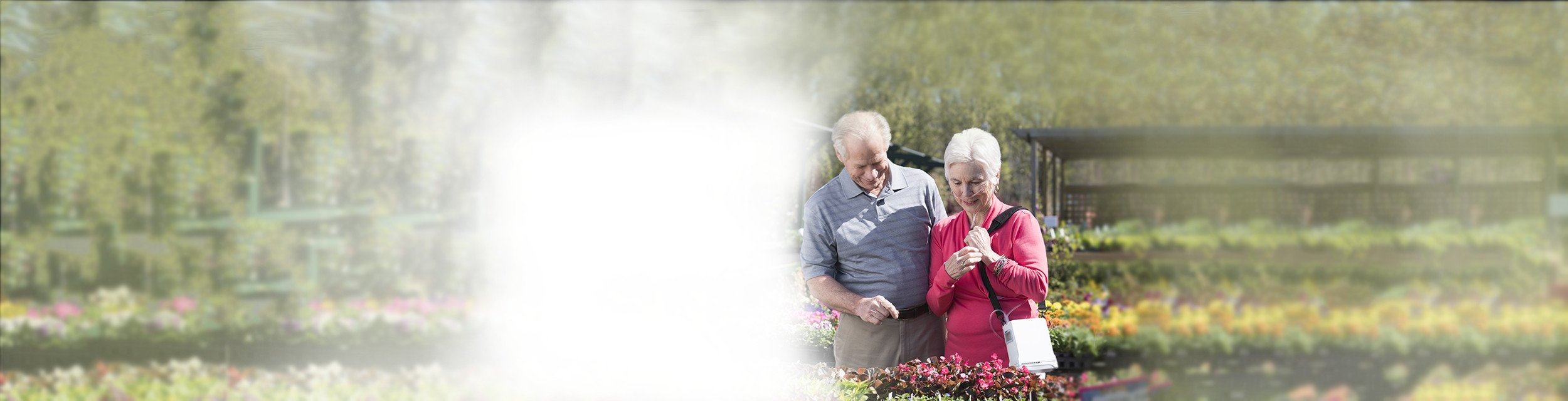 Couple at the Nursery - Woman Carrying Her Inogen One G4